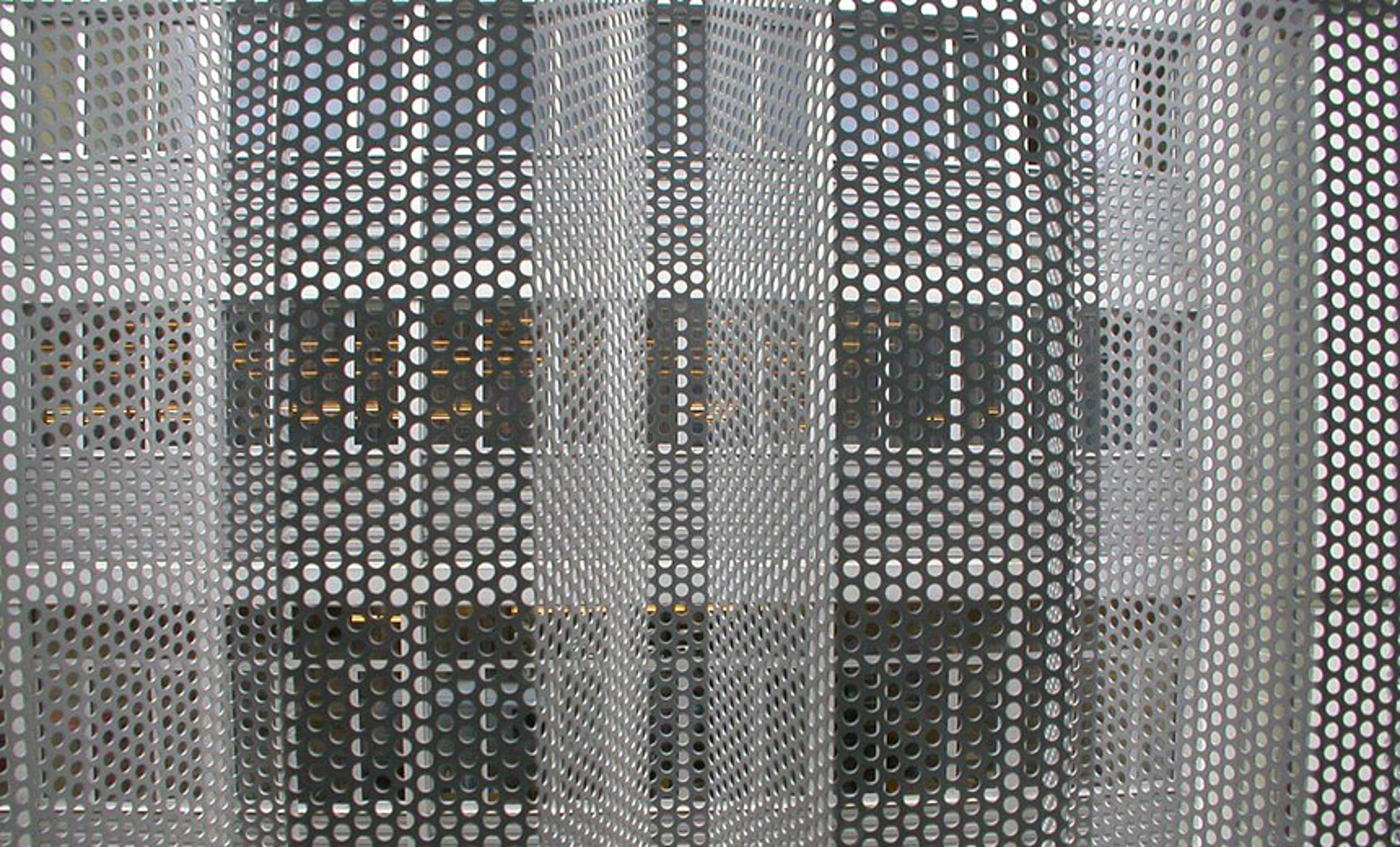 perforated-special-trapezoidal-sheets-as-façade panelling and sun protection